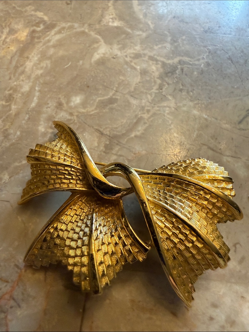 Elaborate 1960s gold tone, crossover Trifari new without tags brooch